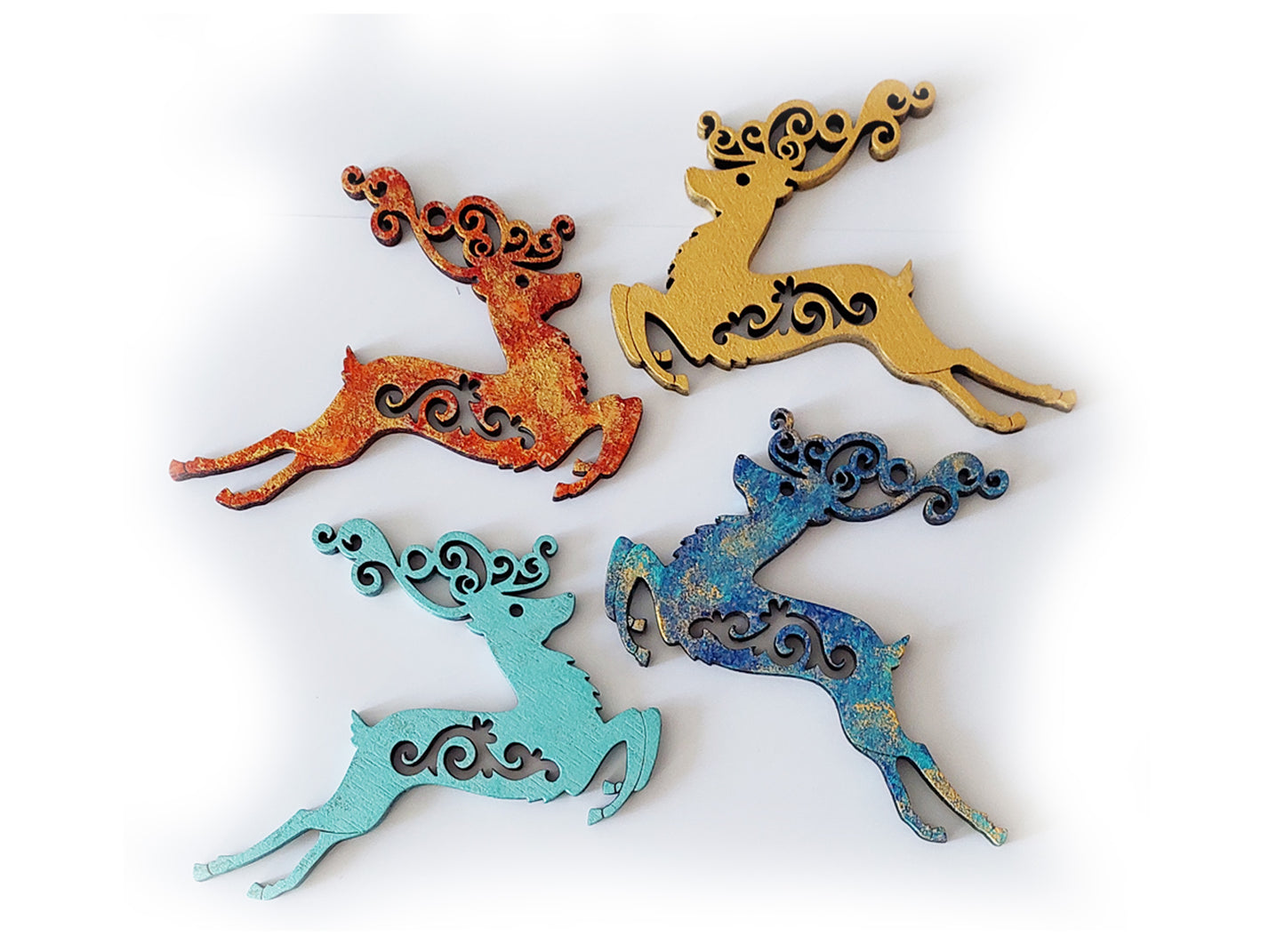 Set din 4 reni de Crăciun 14x11 cm